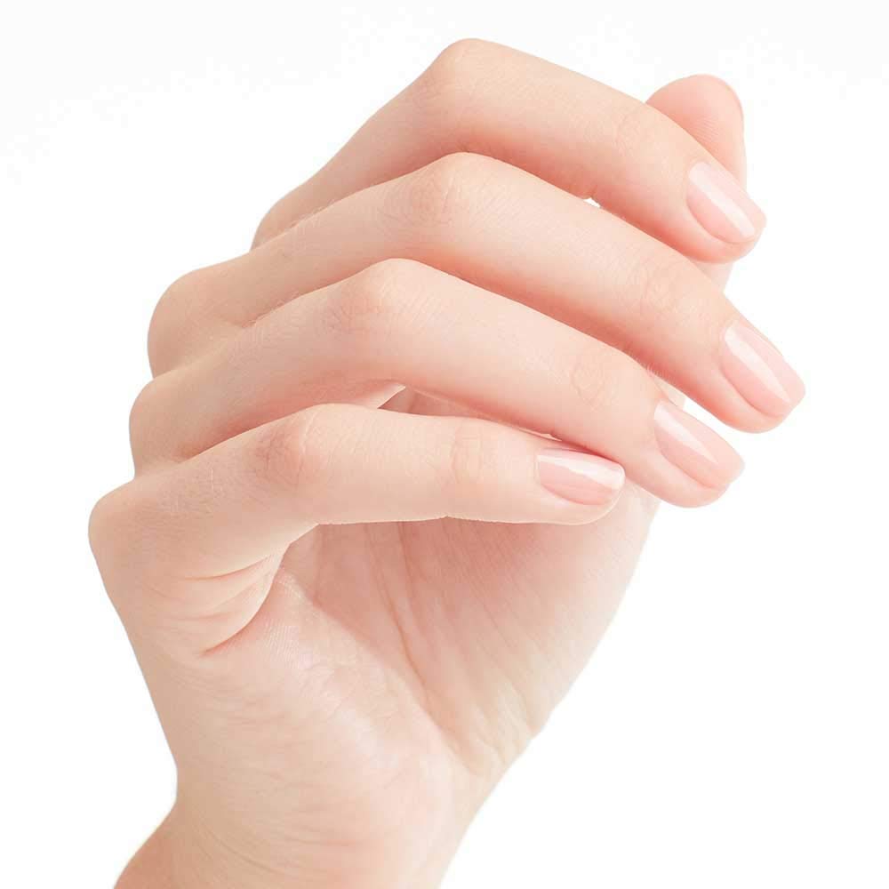 OPI Passion being applied to nails demonstrating smooth streak-free result