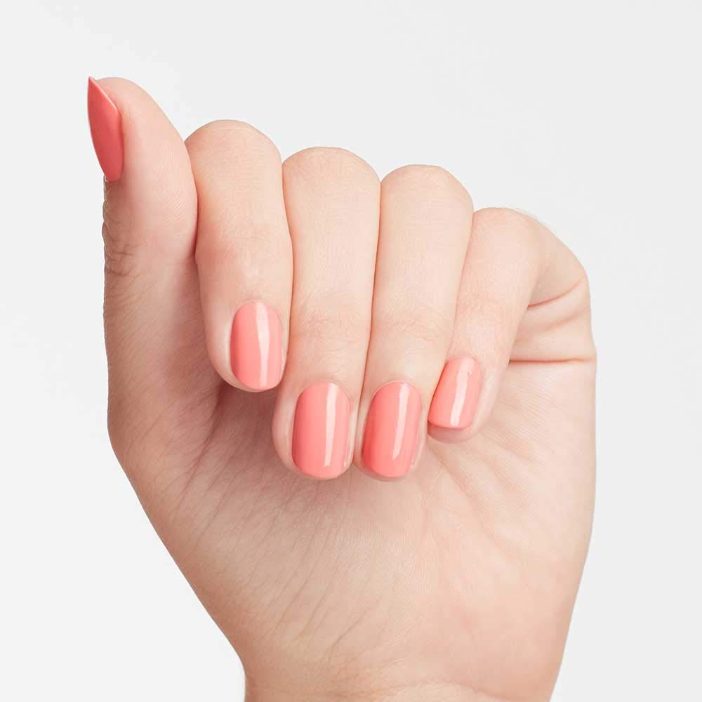 OPI polish on nail tips in sunlight showing high-shine finish