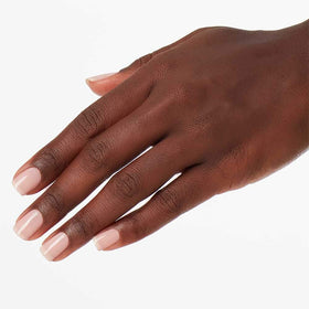 OPI Put It in Neutral swatches on skin illustrating shade variation and wearable color