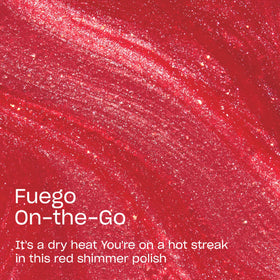 Close-up shimmer texture of OPI Fuego glaze highlighting rich red sparkle
