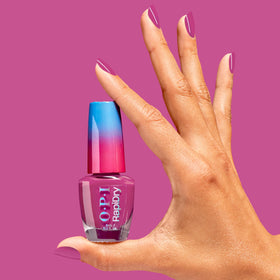 OPI polish being applied on a fingernail highlighting quick-dry, smudge-resistant result