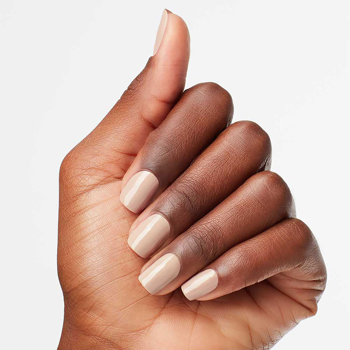 OPI on-model hand showing Samoan Sand for scale and everyday elegance