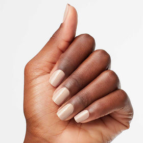 OPI on-model hand showing Samoan Sand for scale and everyday elegance
