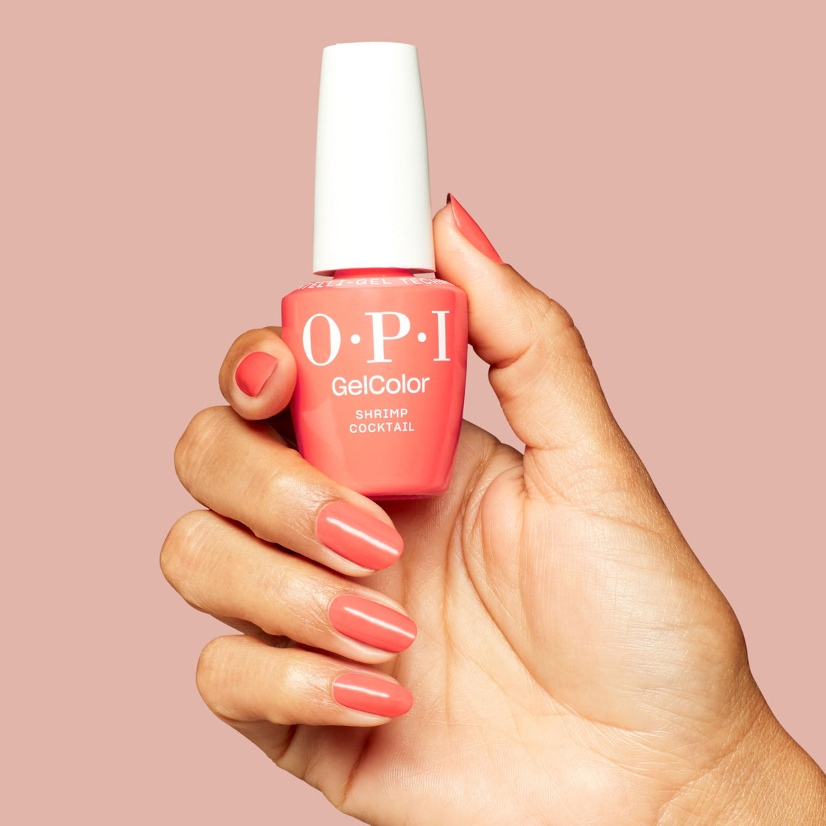 OPI Shrimp Cocktail curing under LED lamp for fast, chip-resistant finish