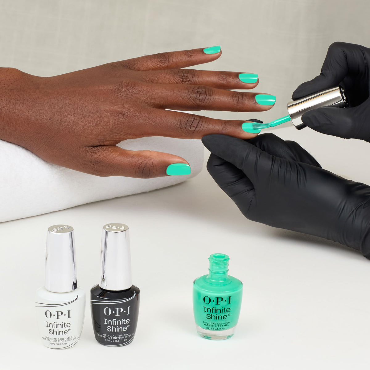 OPI bottle next to coin showing size and scale convenience benefit