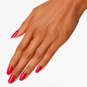 OPI bottle in cozy lifestyle setting with hands wearing long-lasting polish