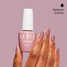 OPI swatch on hand showcasing opaque nude-pink and professional look benefit