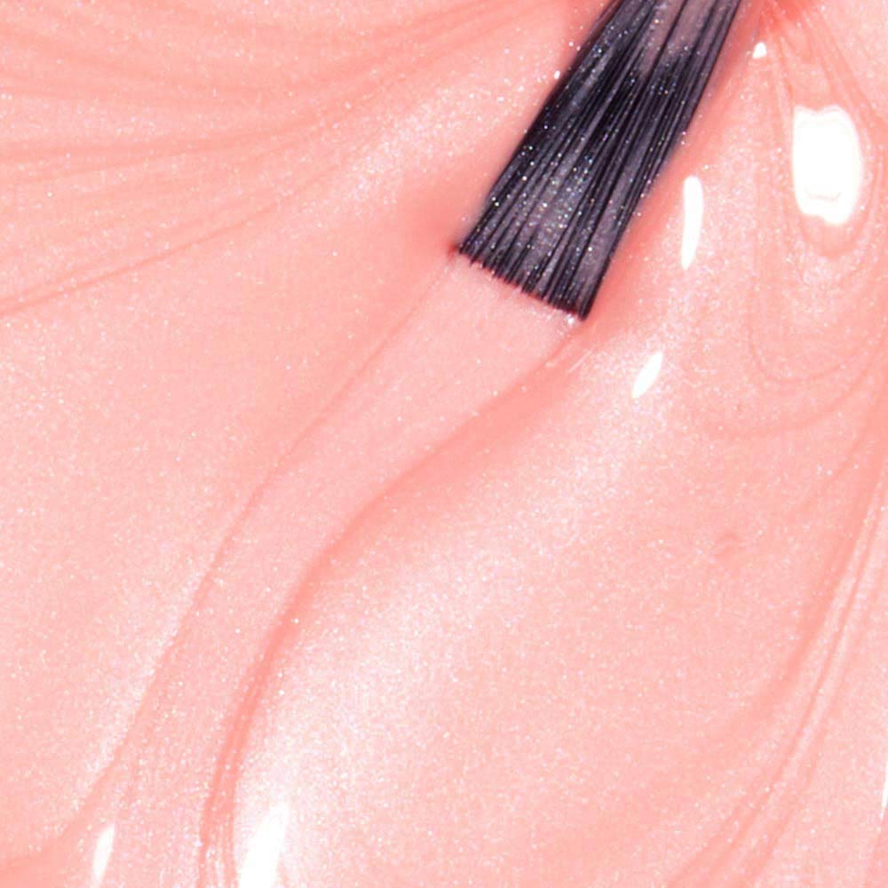 OPI Tutti Frutti Tonga swatch on skin showing true color payoff and flattering peach-pink effect