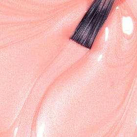 OPI Tutti Frutti Tonga swatch on skin showing true color payoff and flattering peach-pink effect