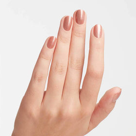 OPI manicure with Worth a Pretty Penne on nails showing long-lasting shine