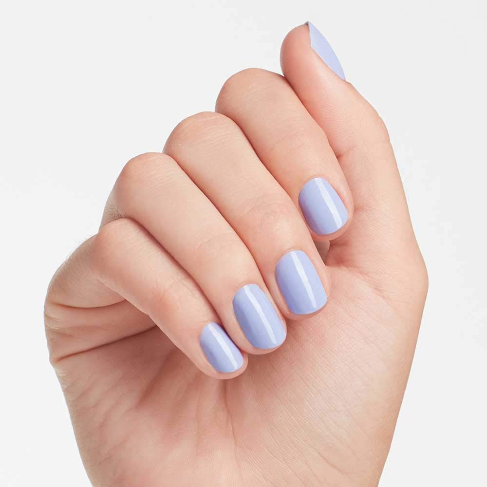 OPI bottle next to ruler showing size and travel-friendly benefit