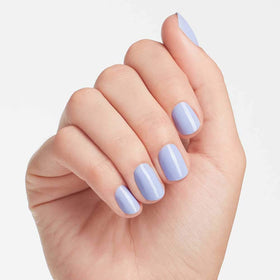 OPI bottle next to ruler showing size and travel-friendly benefit