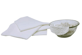 Organic Cotton Mart folded stack on bath towel styled for sustainable skincare