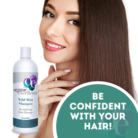 Organic Excellence shampoo in hand during use demonstrating gentle lather and scalp comfort benefit