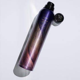Oribe Après styled hair lifestyle shot showing tousled waves and touchable shine