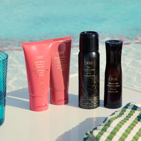 Oribe Bright Blonde 1.7 oz in hand showing travel-friendly size and convenience