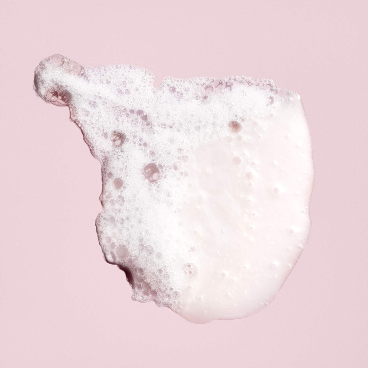 ORIBE close-up foam texture highlighting gentle cleansing benefits