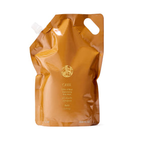 ORIBE front pouch packaging showing product name and refill benefit