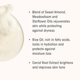 ORIBE rich lather on hand showcasing nourishing cleanse and soft skin