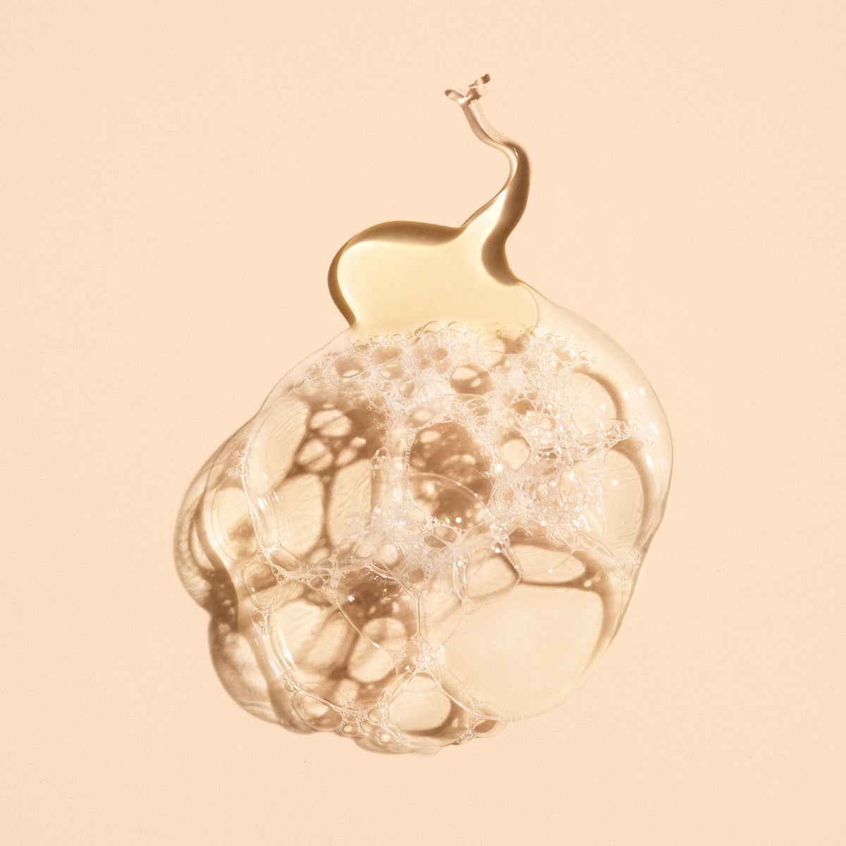 Oribe Cote d'Azur displayed in a styled bathroom offering a refined hand-wash ritual