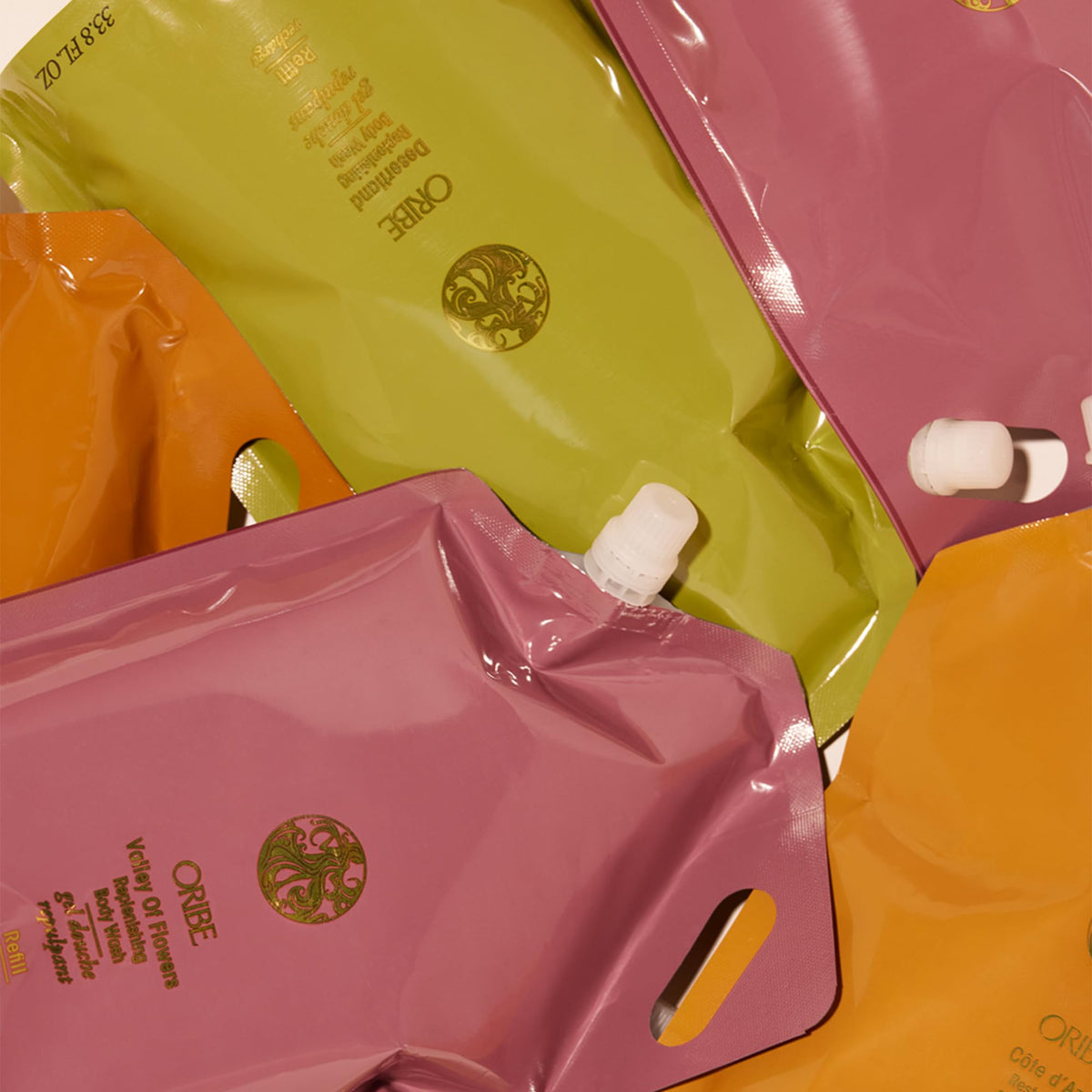 ORIBE refill packaging with recycling symbol emphasizing reduced plastic use