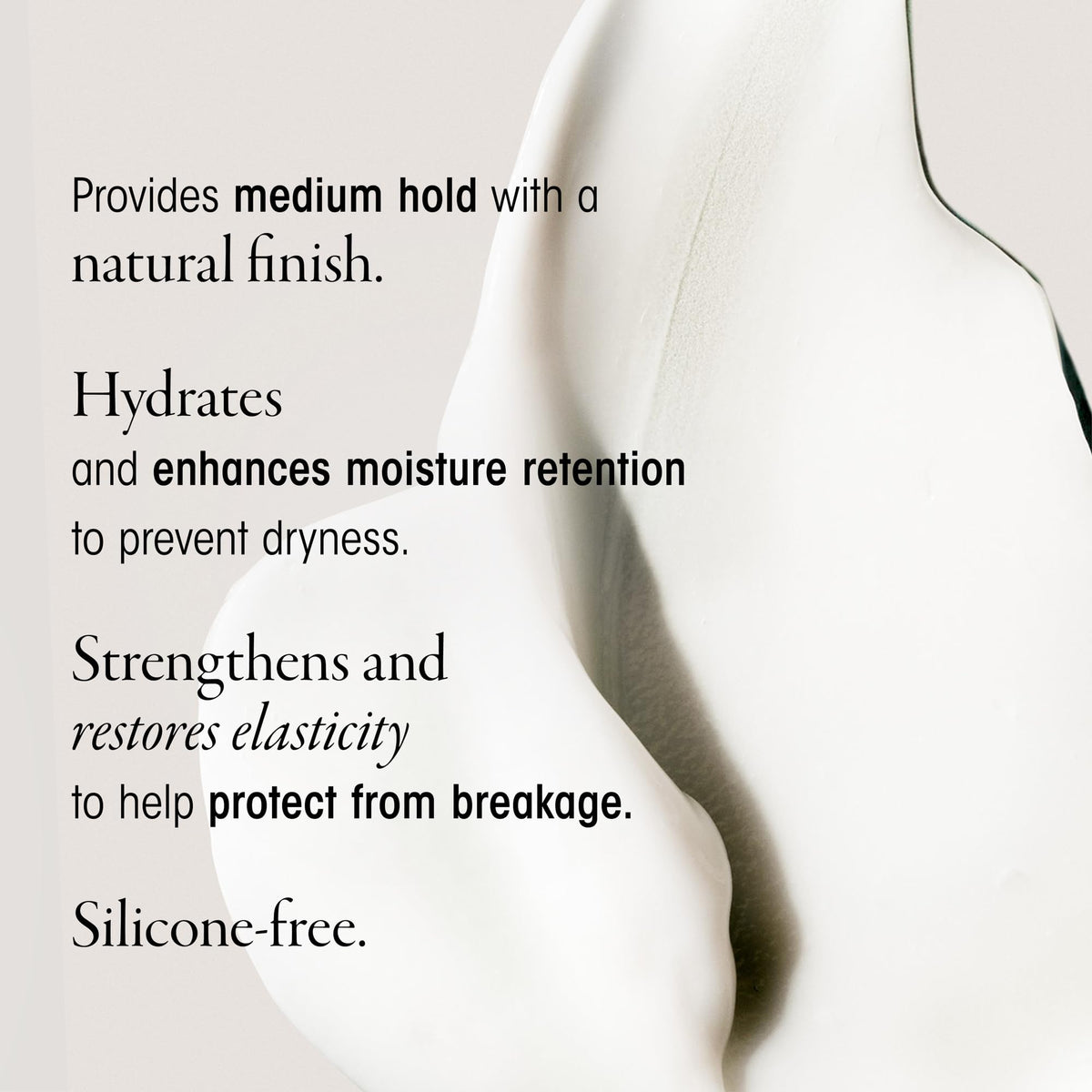 Oribe cream on hand demonstrating smooth application and quick spreadability