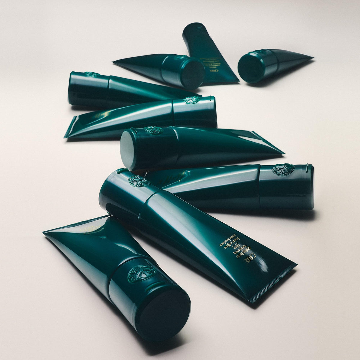 Oribe defined curls after use showing reduced frizz and natural bounce
