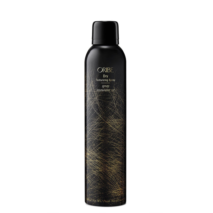 Oribe dry texturizing spray front view showing sleek packaging and benefit of volume