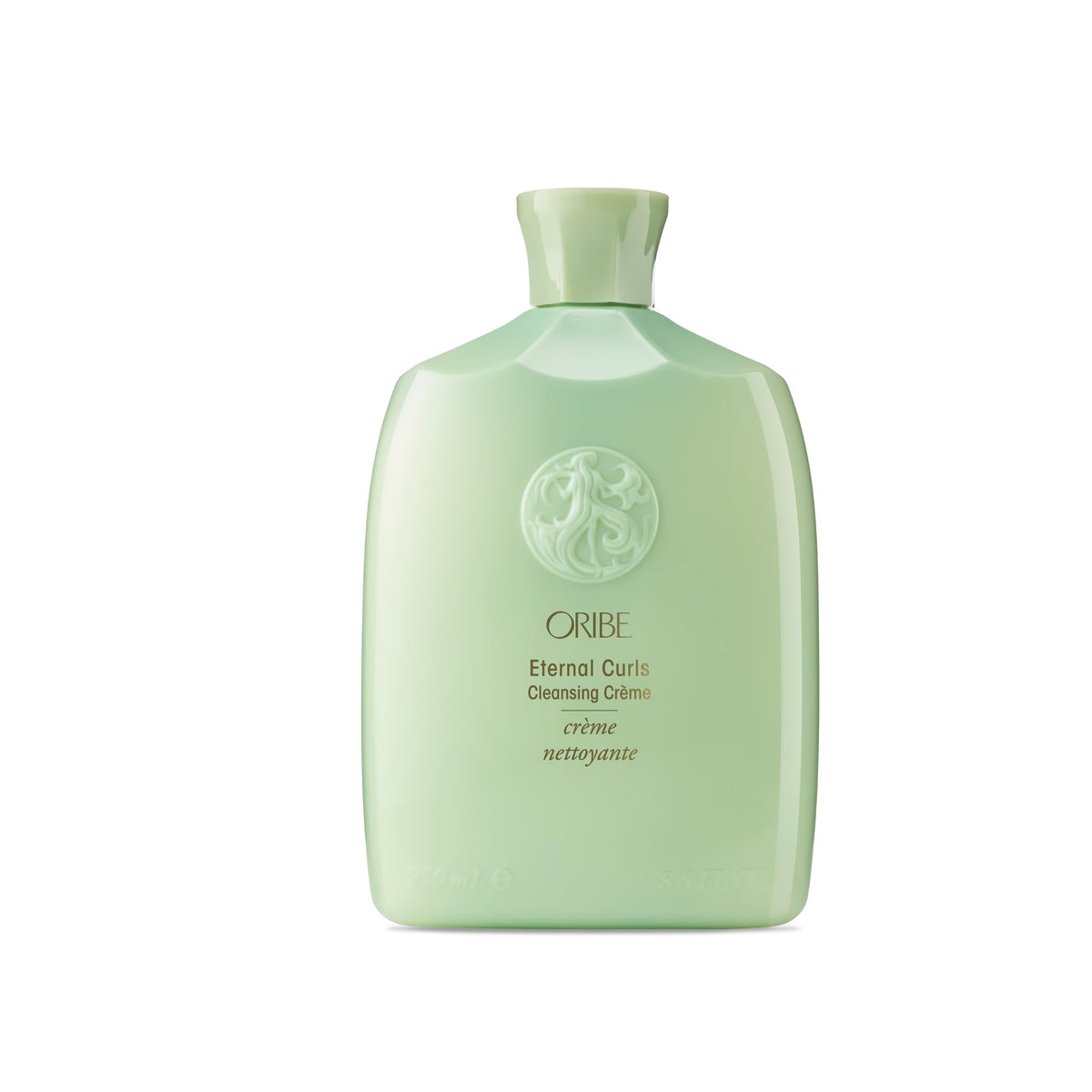 Oribe front packaging showing bottle with elegant label and premium finish benefits