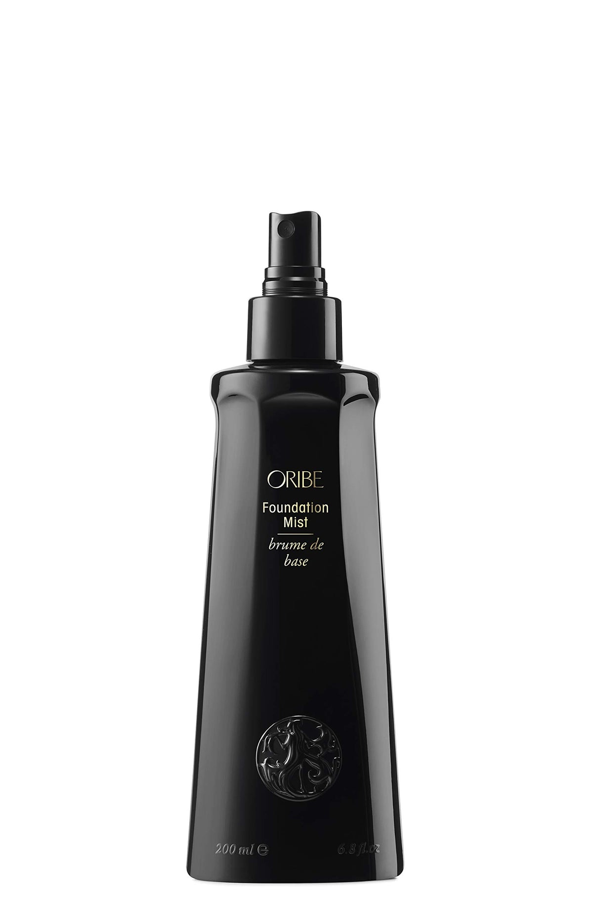 Oribe Foundation Mist being applied to hair for shine and detangling