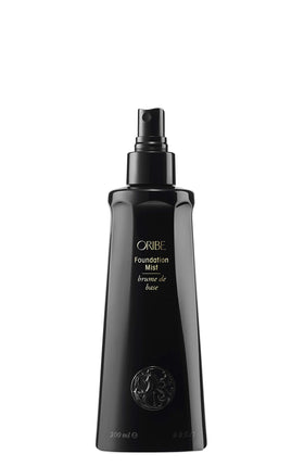 Oribe Foundation Mist being applied to hair for shine and detangling