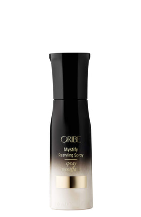Oribe front packaging displaying product benefits and elegant bottle design