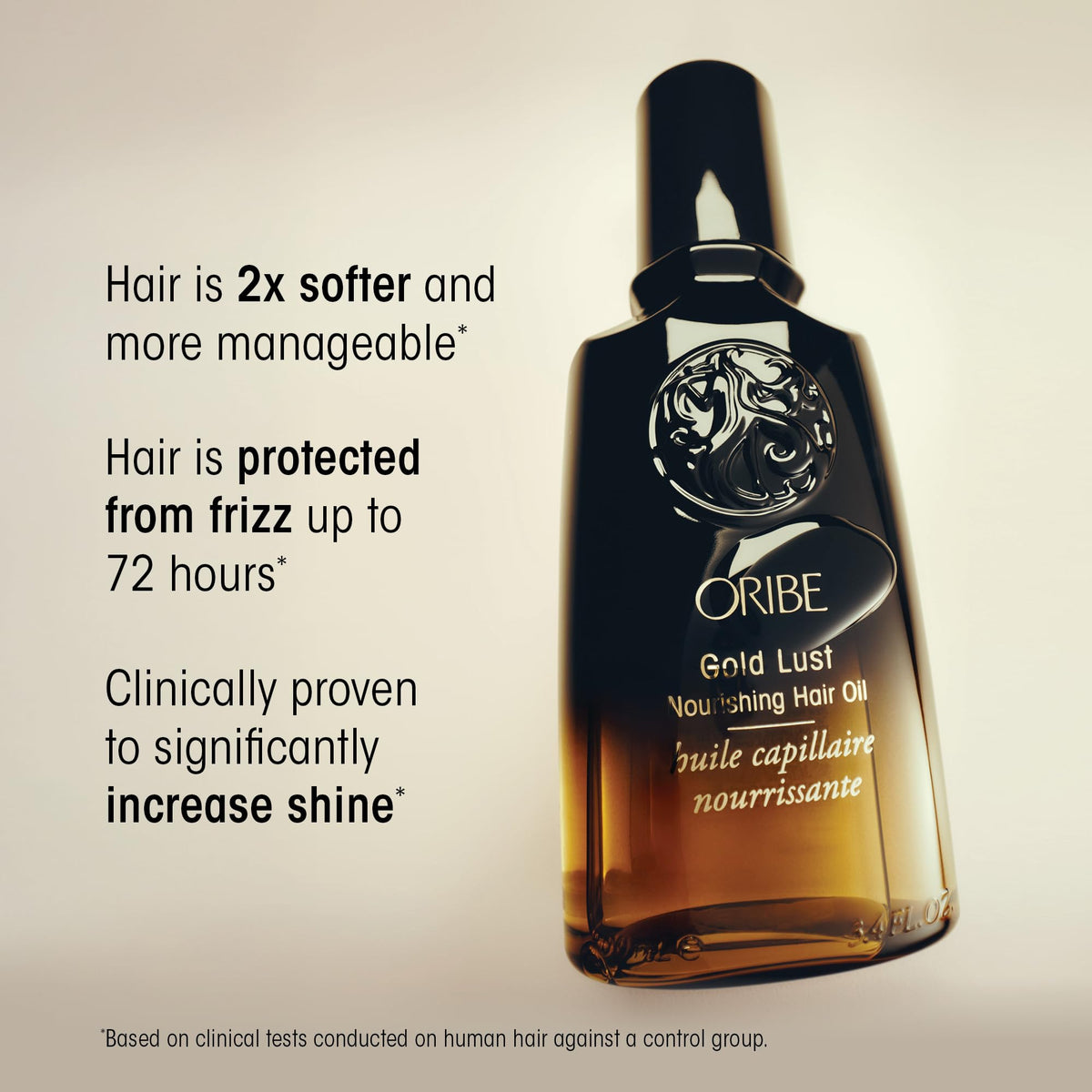Oribe Gold Lust application on hair strand showing smoother, shinier finish