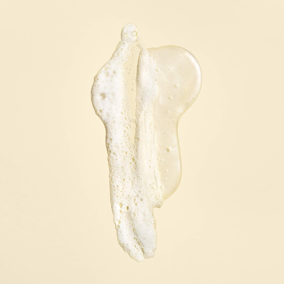 Oribe Gold Lust in-shower application on wet hair illustrating restorative use and smooth results