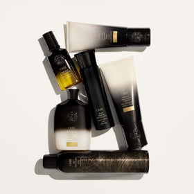 Still life with ingredients evokes Oribe Gold Lust scent and luxurious experience