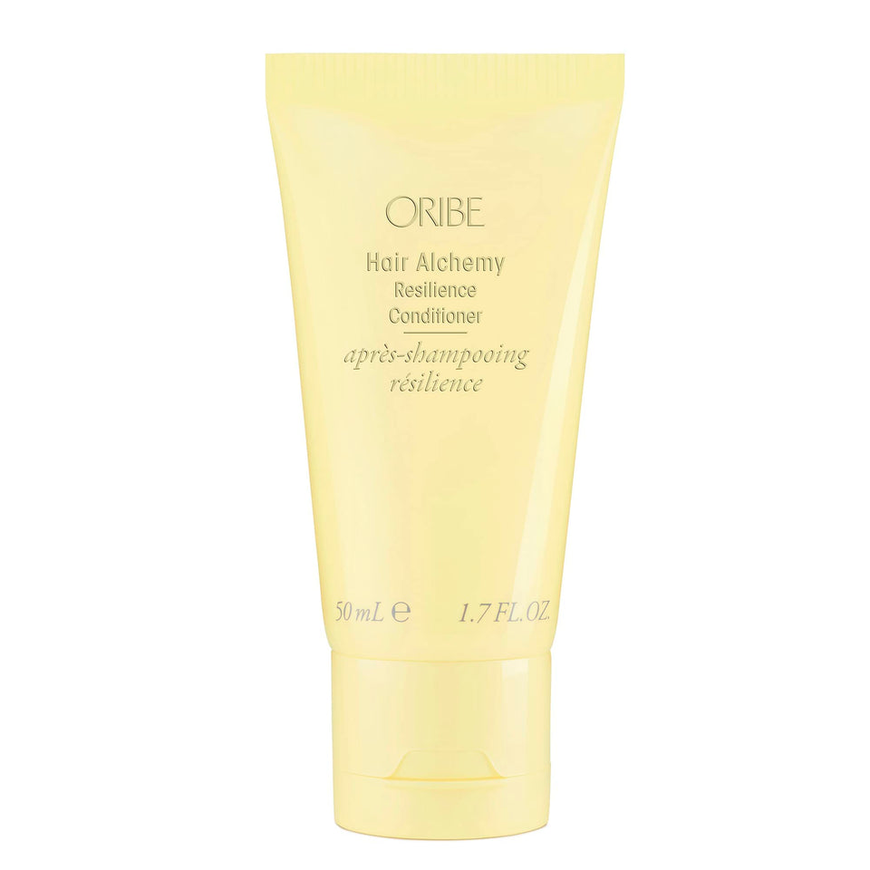 Oribe Hair Alchemy front bottle shows elegant branding and travel-friendly size