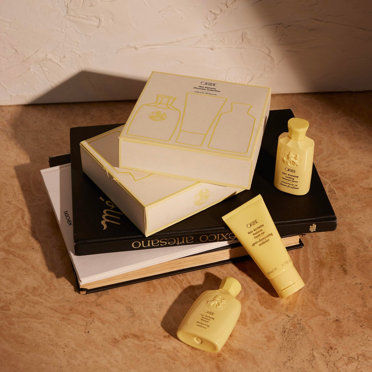 ORIBE lifestyle beach routine with products conveying fresh coastal scent