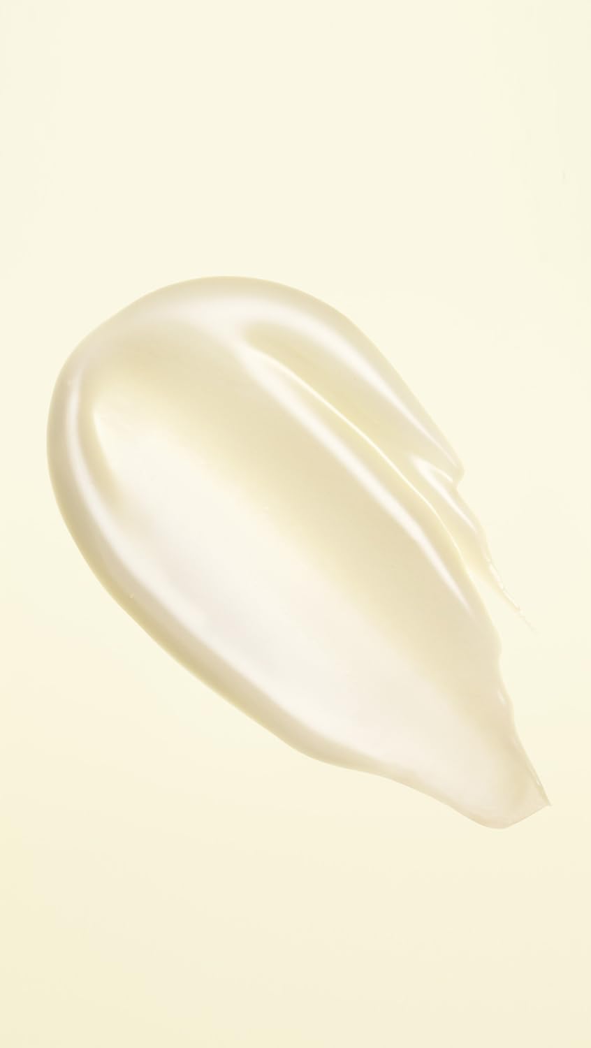 Oribe pump and cap detail highlighting easy dispensing and precise usage
