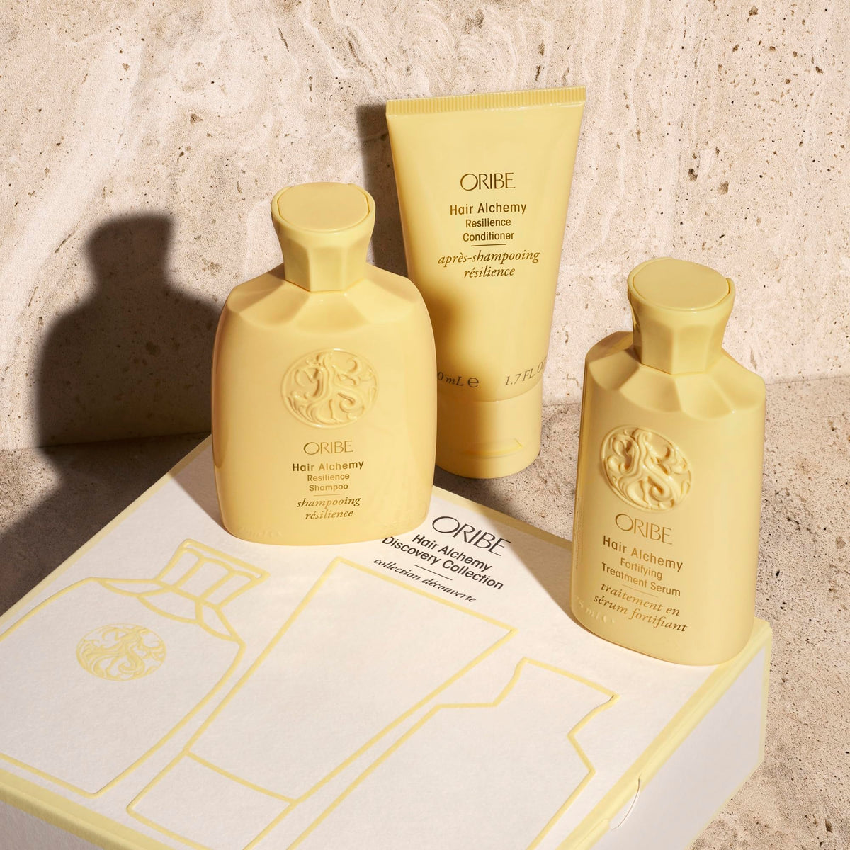 ORIBE shampoo pump detail highlighting gentle formula and easy dispensing
