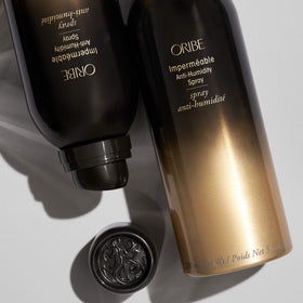 Oribe Impermeable nozzle close-up showing fine mist texture for even product distribution