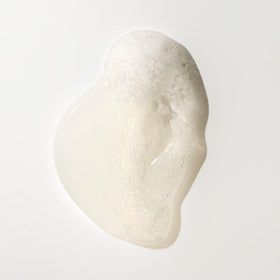 Oribe ingredients panel close-up showing botanical extracts and strength-building actives
