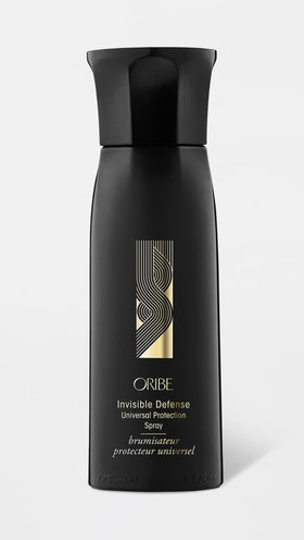 Close-up of Oribe label and ingredients panel highlighting protection and clean-beauty benefits
