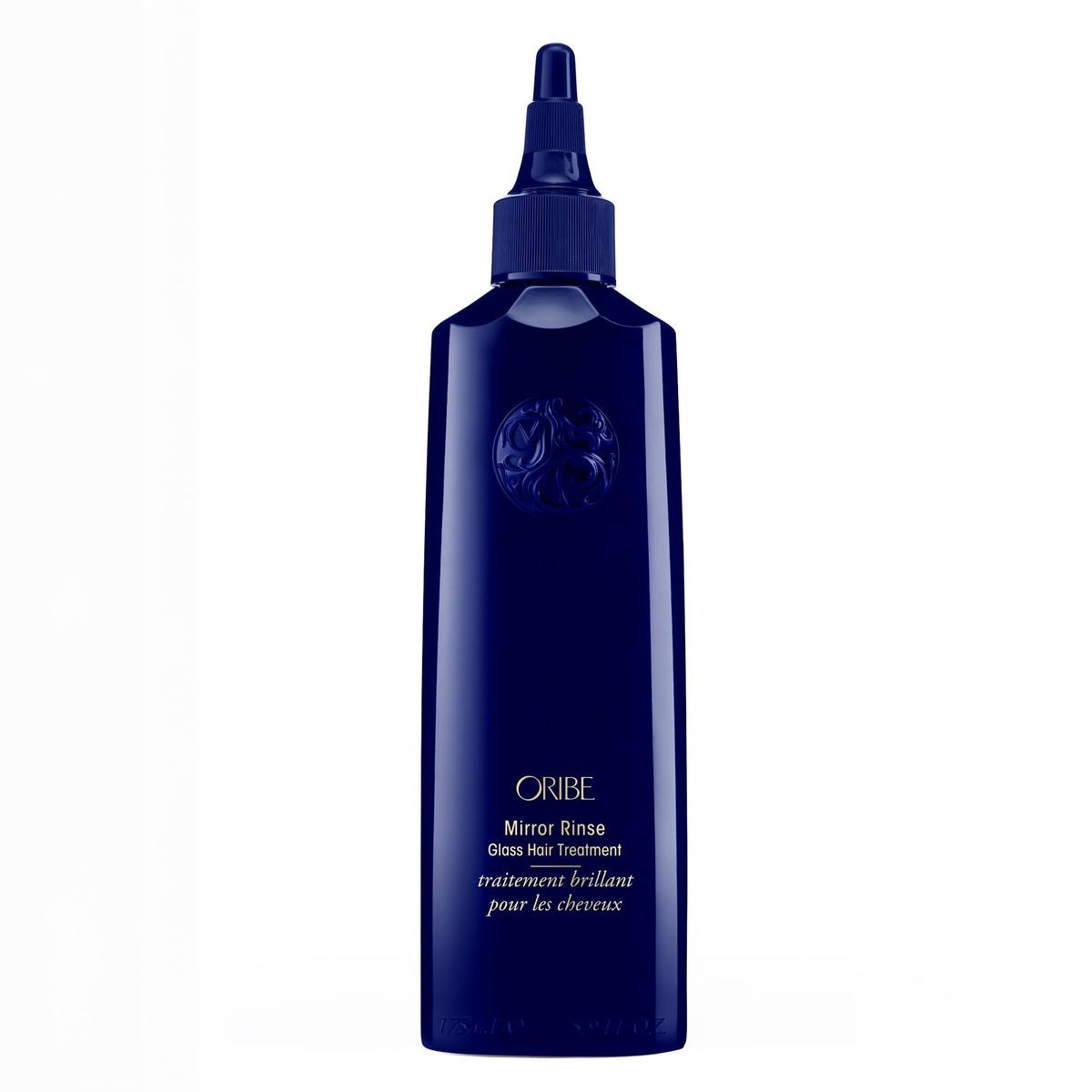 ORIBE front packaging shot showing elegant bottle and premium finish benefit