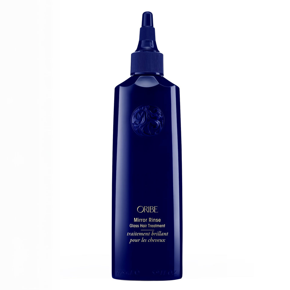 ORIBE front packaging shot showing elegant bottle and premium finish benefit
