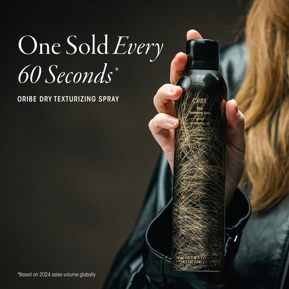 Oribe nozzle closeup highlighting spray control and precise application benefit