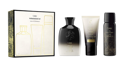 Oribe Obsessed Set front packaging showing trio for travel, luxury convenience by Oribe
