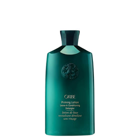 Oribe Priming Lotion front packaging showing sleek bottle and brand
