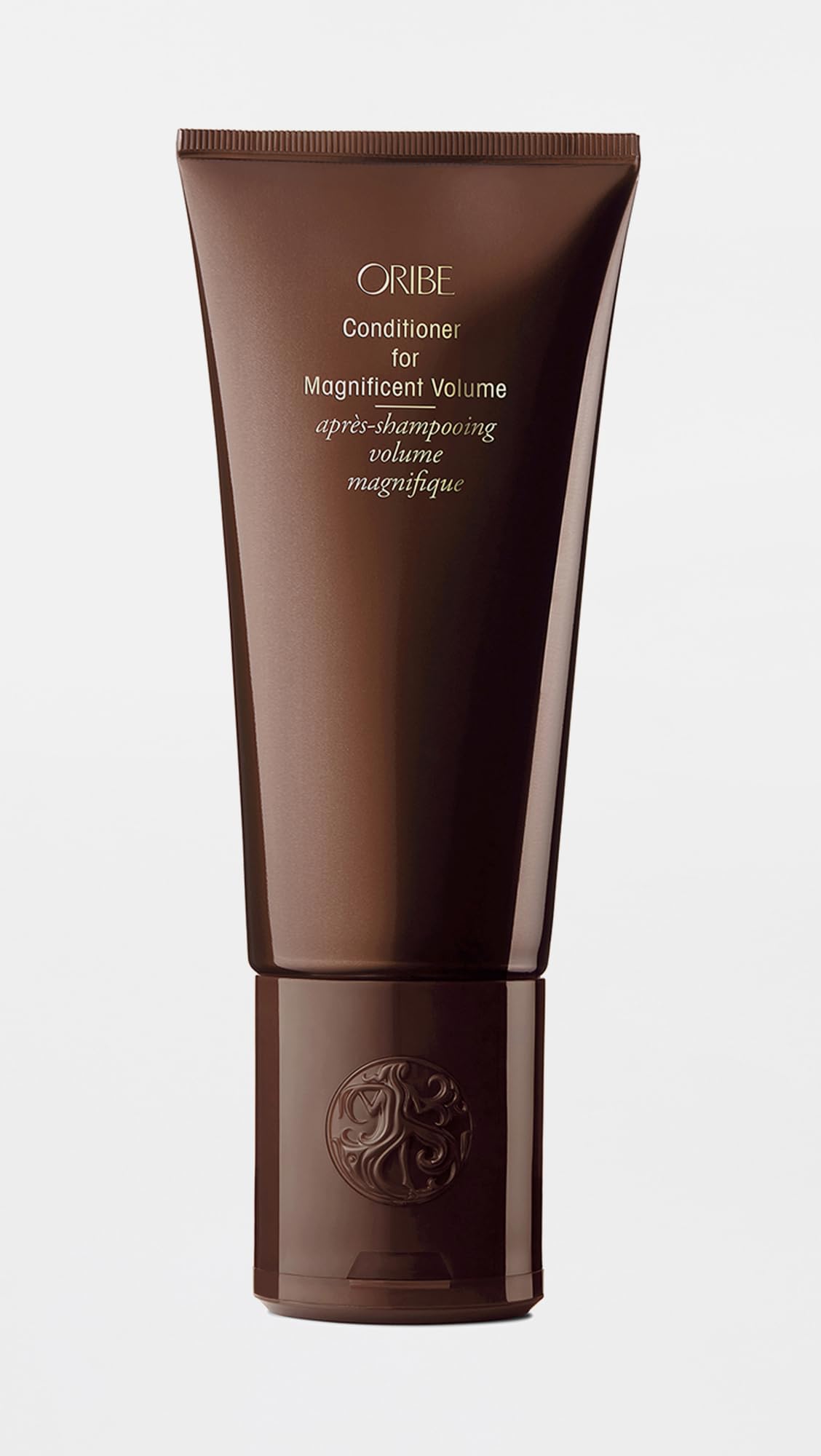 Oribe dispenser detail and label view highlighting ease of use and luxury