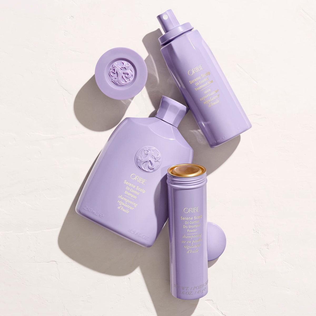 Oribe Serene Scalp on bathroom shelf in lifestyle setting suggesting daily scalp-refresh routine