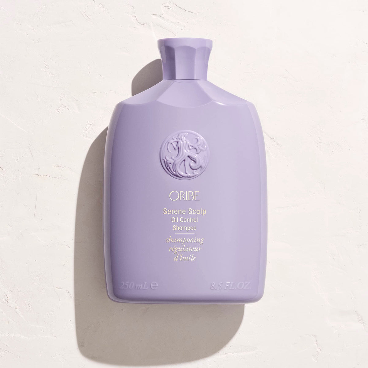ORIBE shampoo in bathroom setting suggesting calming routine benefit